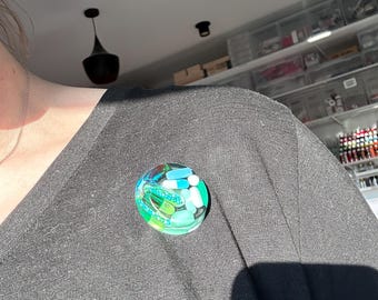 The Mystery Bin - Wearable Flare Pin (Single)
