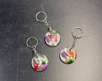 Round 5 Dollar Chill Pill Keychain (single)
