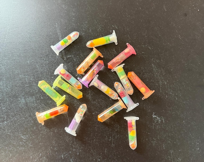 Ready to Ship Happy Accidents - Pills in Resin Color Vials Pack of 16 2026-HA-403