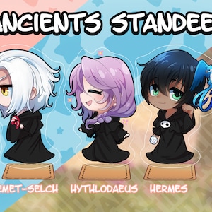 May include: Three anime-style character stand-up figures with black robes and white accents. The characters are Emet-Selch, Hythlodaeus, and Hermes. The figures are on a white background with stars and hearts.