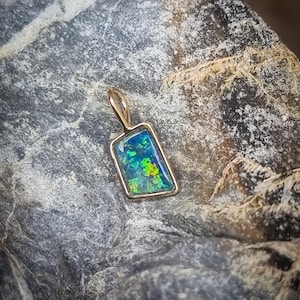 18K Gold Pendant, with an Australian Black Opal, Lightning Ridge
