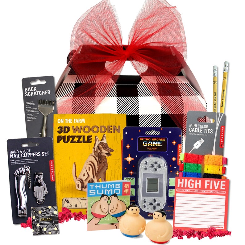 May include: A black and white checkered gift box with a red bow. The box is filled with various gifts, including a 3D wooden puzzle, a retro arcade game, a set of mini color cable ties, a thumb sumo game, a set of nail clippers, a back scratcher, and a high five notepad. The notepad has the words 'HIGH FIVE' printed on it.