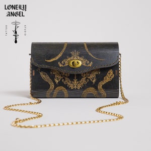 Monedero tatuado Birchwood “Serpiente y Huesos”