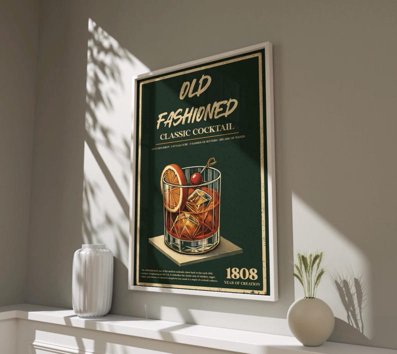 May include: A vintage-style poster with a green background featuring a glass of Old Fashioned cocktail with an orange slice and a cherry. The text reads "Old Fashioned Classic Cocktail" and "1808 Year of Creation".
