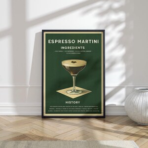 May include: A framed poster displaying an Espresso Martini recipe. The design features a dark green backdrop with the drink's ingredients and a detailed illustration of the cocktail. The text includes the words "Espresso Martini" in bold lettering.
