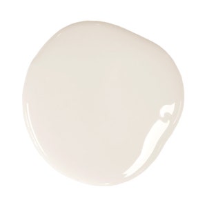 May include: A white, round, glossy paint sample.