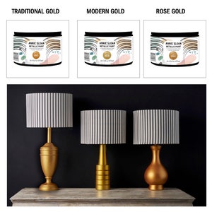 May include: Three bottles of Annie Sloan Metallic Paint in Traditional Gold, Modern Gold, and Rose Gold. Each bottle is 1/2 pint (142 ml) and features a gold label with the Annie Sloan logo and the words "Metallic Paint" and "Gold".