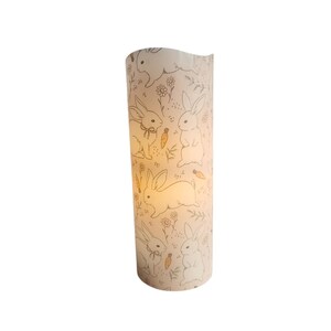 Easter LED Flameless Wax Pillar Candle White Bunnies on Pink