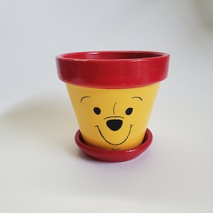 Handmålad Nalle Puh-ansikte Blomkruka Flera storlekar