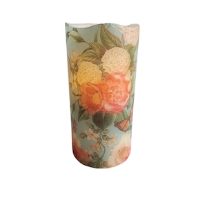 LED Flameless Wax Pillar Candle Romantic Flowers on a Turquoise Background