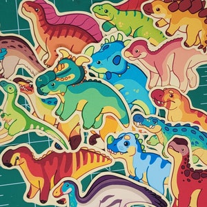Adorables pegatinas de dinosaurios: acabado mate, diseño dibujado a mano