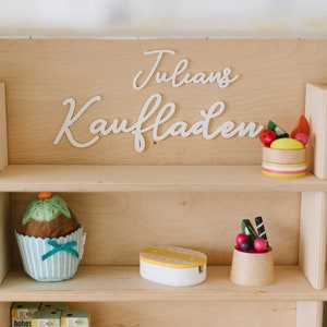 Skylt 'Butik + Namn'