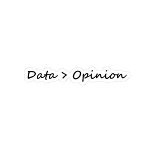 May include: A white sticker featuring the text "Data > Opinion" in a black, handwritten-style font. The sticker has a white border and is suitable for various surfaces.