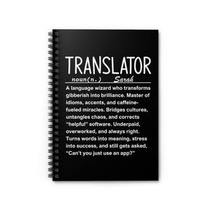 May include: A black spiral-bound notebook featuring the word "TRANSLATOR" in white. The text describes a translator's skills, including transforming "gibberish into brilliance" and the question, "Can't you just use an app?"