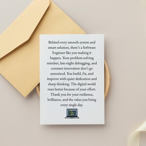 May include: A white greeting card with text for a Software Engineer, accompanied by a gold envelope. The card's message praises the engineer's problem-solving skills and dedication. A small graphic of a laptop is at the bottom.