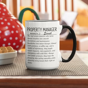May include: White ceramic coffee mug with a black handle. The mug has a black border and text that reads "PROPERTY MANAGER noun(n.) Sarah The real estate maestro who turns tenant troubles into smooth resolutions and maintenance headaches into minor hiccups. Armed with patience, a coffee cup, and a toolkit of diplomacy, they juggle repair requests, rent payments, and emergency calls with flair. Always cool under pressure, they keep the property ship sailing smoothly while ensuring every tenant feels right at home."