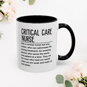 May include: White ceramic mug with a black rim and handle. The mug has black text that reads "CRITICAL CARE NURSE" and a definition of the term.