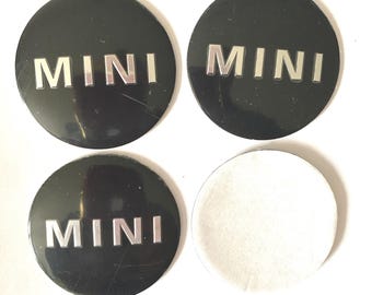 Free 1st Class post SPECIAL PRICE Set  of 4 X 50mm Mini Wheel Centre Caps(Please Measure}