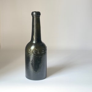 Antieke fles, vintage verzamelbare apotheekfles, rustiek decor, oude apothekerspot.