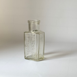 Vintage old bottle. Pharmaceutical jar. Collection glass. Bottle 1939 g