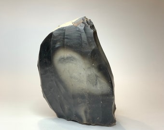 Ancient core. Neolithic. A real neolithic stone.Ancient stone.  Neolithic artifact. Ancient artifact.Stone Age Nucleus.