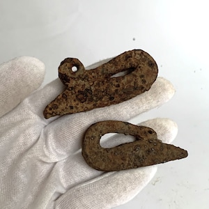 An ancient artifact for making fire. Viking lighter for fire 9th-12th centuries. Viking iron tools.