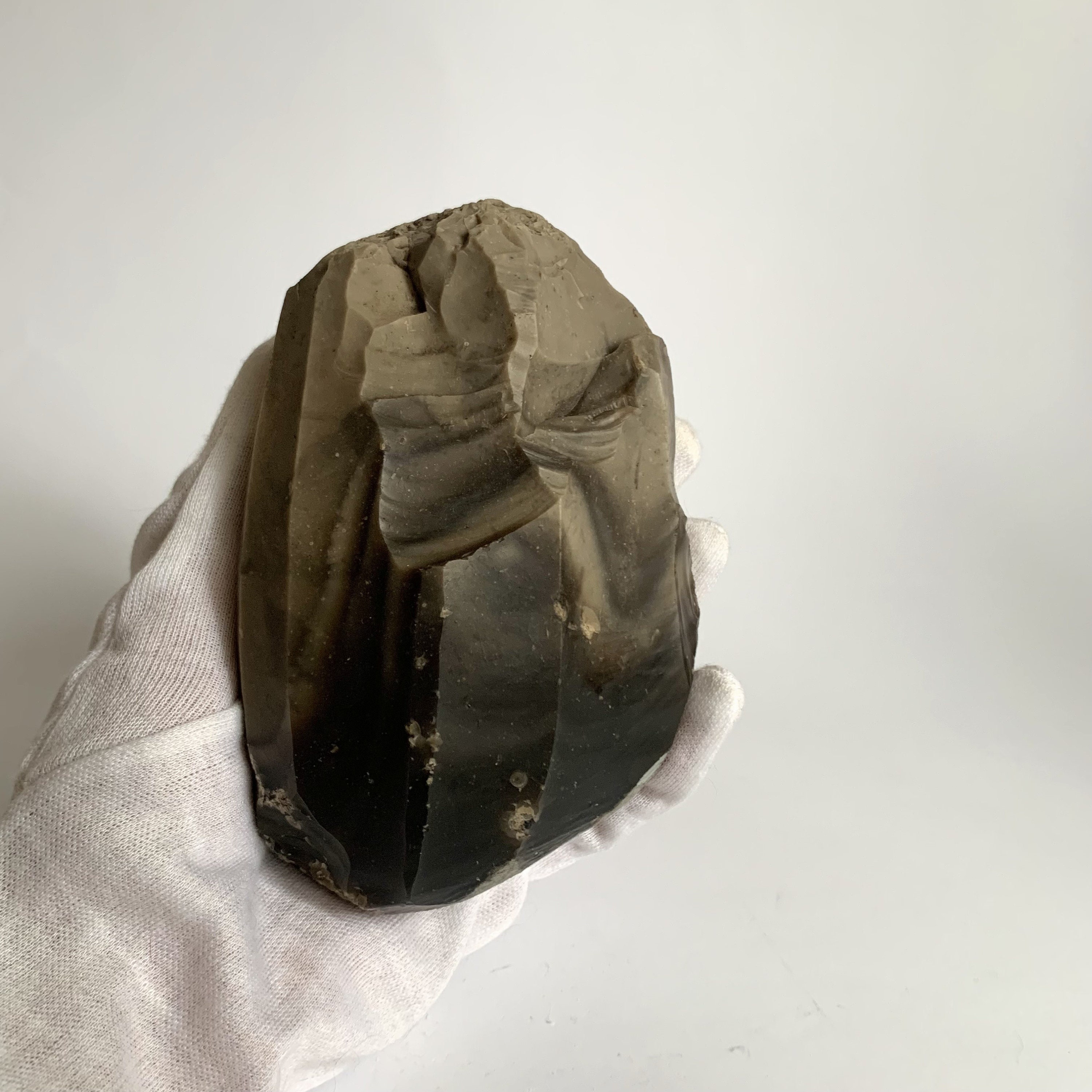 Ancient core. Real Neolithic stone. Ancient stone. Neolithic artifact. Basic antiquities. Neolithic era. Nucleus.(2)