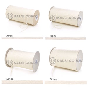 May include: Four spools of white cotton cord, each with a different diameter: 2mm, 3mm, 5mm, and 6mm. The spools are labelled "Kalsi Cords".