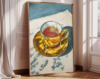Può includere: Dipinto incorniciato di una tazza e un piattino. La tazza e il piattino sono gialli con vortici marroni. La tazza è riempita con un liquido rosso. Lo sfondo è un motivo blu chiaro e bianco. Il dipinto è in una cornice dorata.