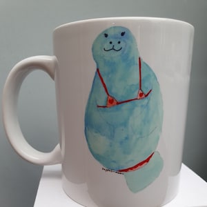 Manatee beach ready mug