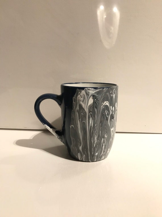Poured acrylic paint on coffee mug