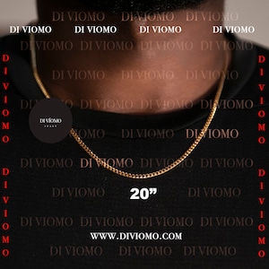 Puede incluir: Un collar de cadena de oro sobre un fondo negro. La cadena tiene 50,8 cm de largo y un dise&ntilde;o de eslabones de cadena. El texto "DIVIOMO ITALY" y "WWW.DIVIOMO.COM" es visible en la imagen.