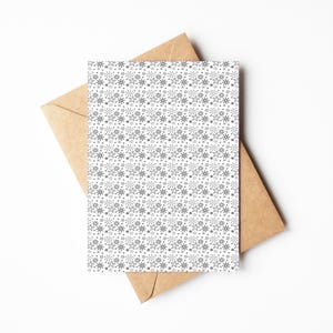 Tarjeta de felicitación, diseño de copos de nieve en blanco y negro, perfecta para desear unas felices fiestas, un regalo de feliz Navidad y felicitaciones de temporada