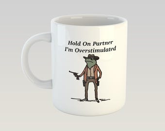 Hold On I'm Overstimulated Frog Meme Funny Gen Z Cowboy Weirdcore Weird Stuff Ironic Silly Novelty Coworker Mug 11oz Gift Box