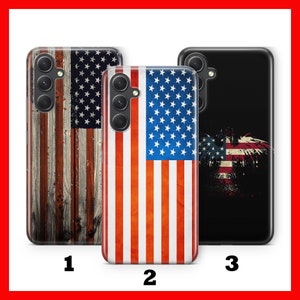 May include: Three phone cases with different designs featuring the American flag. The first case has a wood grain background with the American flag overlayed. The second case has a solid American flag design. The third case has a black background with a distressed American flag eagle design.
