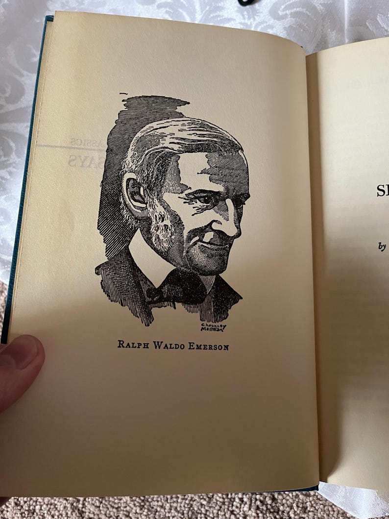 May include: A black and white illustration of Ralph Waldo Emerson, an American essayist, poet, and philosopher. The illustration is from a book titled "Self-Reliance" by Ralph Waldo Emerson.