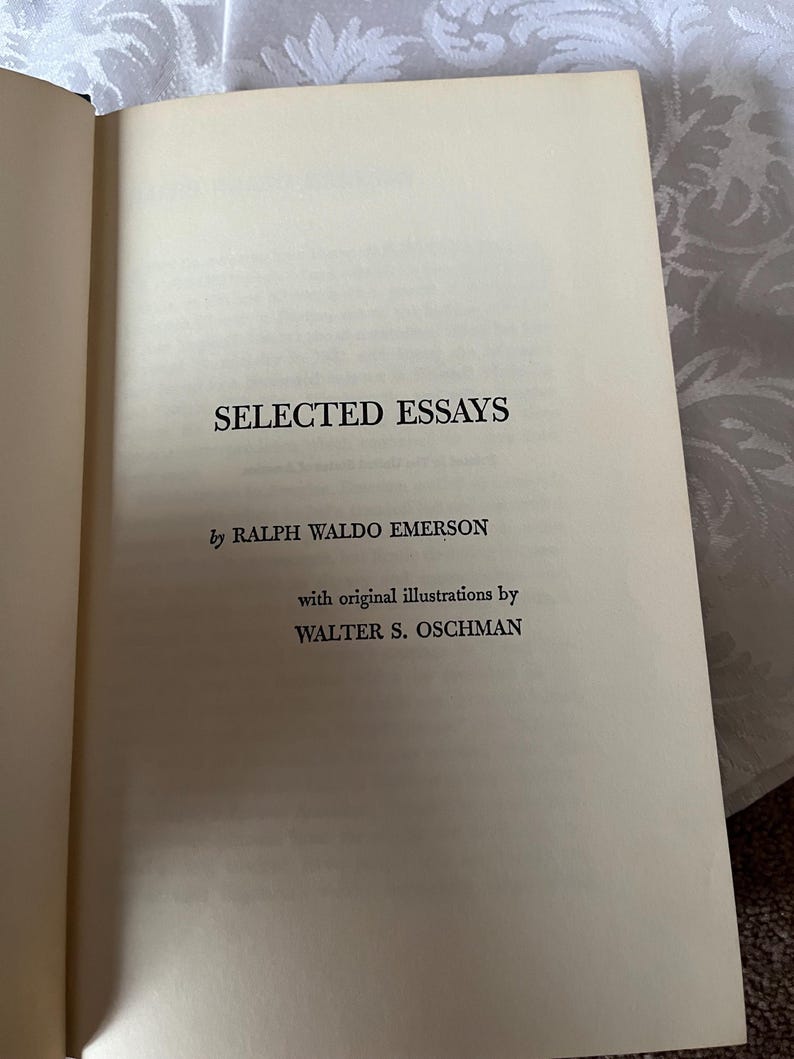 May include: A book titled "Selected Essays" by Ralph Waldo Emerson with original illustrations by Walter S. Oschman.