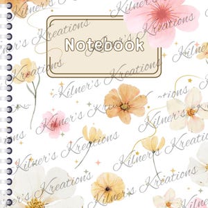 May include: A spiral-bound notebook with a white cover adorned with watercolor-style flowers in shades of peach, pink, and cream. The word "Notebook" is centered within a rectangular frame. The design includes the text "Kilner's Kreations".