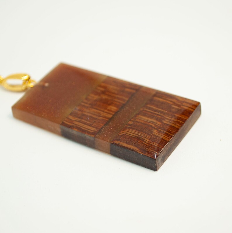 Pendant in Pernambuco and resin