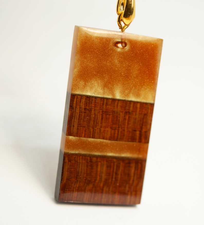 Pendant in Pernambuco and resin