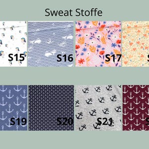 May include: A grid of eight fabric swatches labeled Sweat Stoffe, featuring patterns of birds, whales, flowers, hearts, and anchors in various colors including white, blue, pink, yellow, grey, and maroon, with labels S15 through S22.