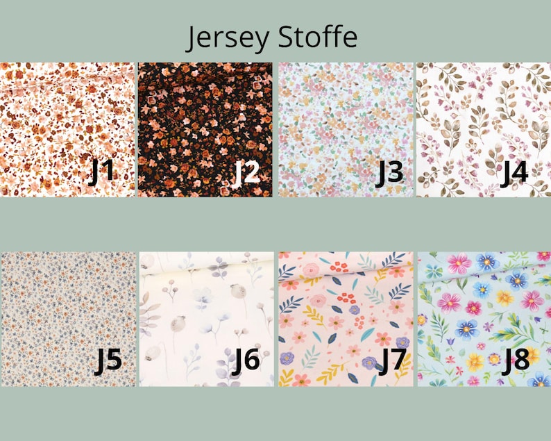 K&ouml;nnte beinhalten: Eine Sammlung von acht Jersey-Stoffmustern, beschriftet von J1 bis J8, mit verschiedenen Blumenmustern in Farben wie Rost, Schwarz, Wei&szlig;, Rosa und Blau. Der Text "Jersey Stoffe" ist oben im Bild zu sehen.