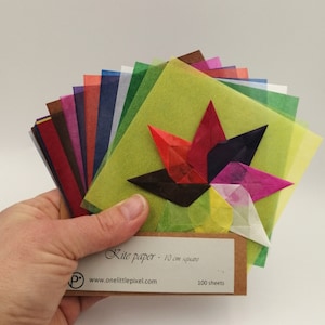 100 sheets of 10 cm square precut kite paper for window stars.