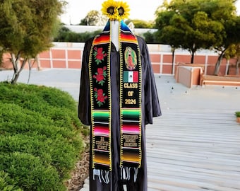 May include: Black graduation gown with a colorful graduation sash featuring a religious image, the text "Class of 2024", and the names "BA Computer Science" and "Christopher Ramirez Granciano".