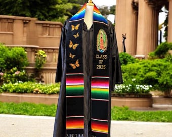 May include: Black graduation stole with a colorful striped pattern and embroidered butterflies and the text "Class of 2025".