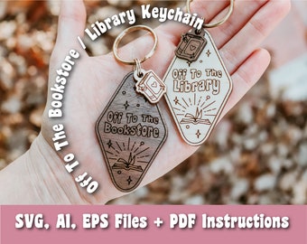 May include: Two wooden keychains with a diamond shape. One keychain is brown and says "Off To The Bookstore" with a book and star design. The other keychain is light brown and says "Off To The Library" with a book and star design. Both keychains have a small book charm attached.