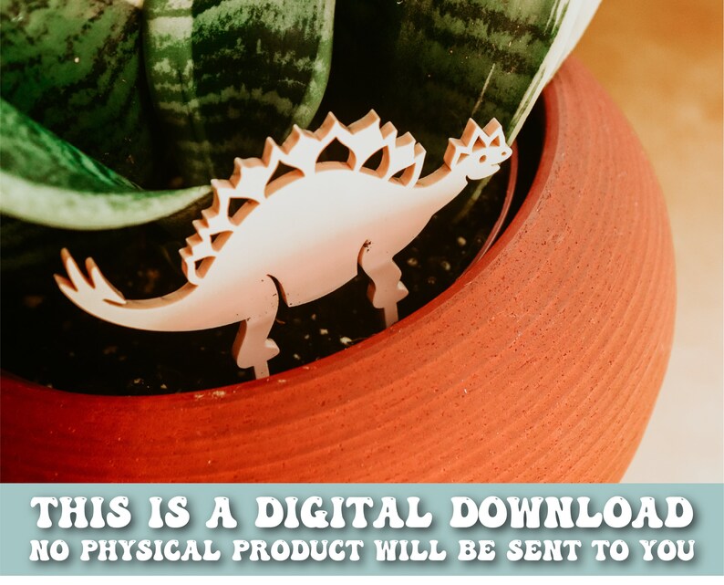 May include: White wooden dinosaur cutout with a spiky back, placed in a terracotta pot with a green plant. The text "THIS IS A DIGITAL DOWNLOAD NO PHYSICAL PRODUCT WILL BE SENT TO YOU" is at the bottom of the image.