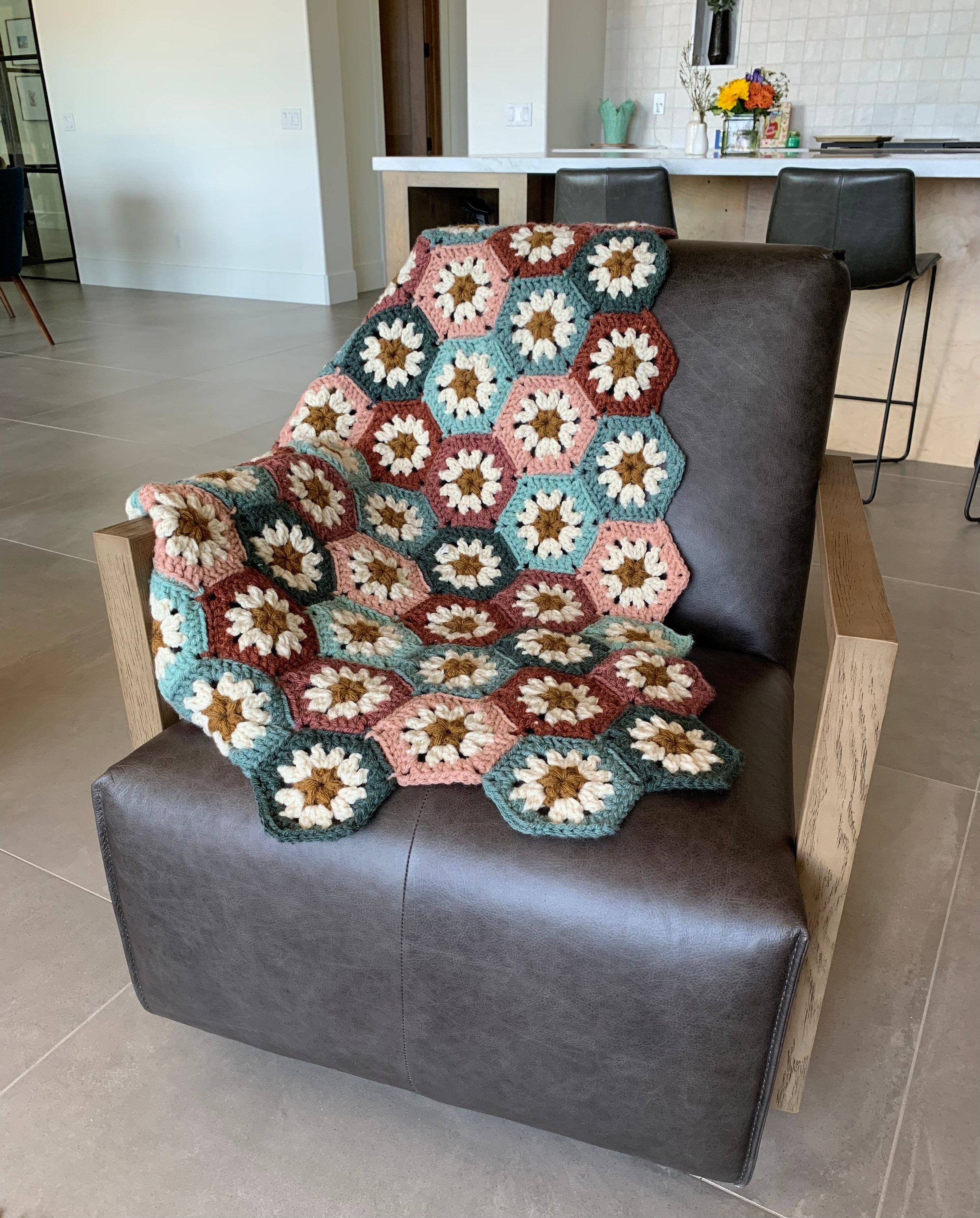 A Beautiful Crocheted Hexi Flower Afghan Created with Lion Brand Hue and Me Chunky Wool Blend Yarn