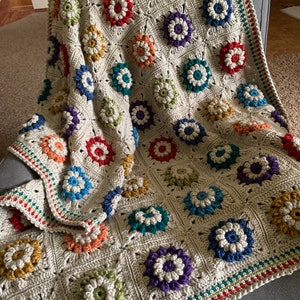 A Fabulous Handcrafted Crocheted Granny Square Afghan Transformed Into a Beautiful Boutique of Flowers