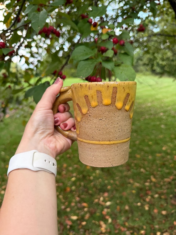 Handmade ceramic mug - 16 ounce muted yellow sunshine mug with thumb pad and textured half design